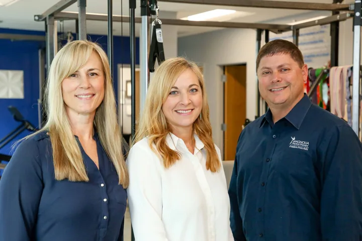 Lisa Taglauer, Beth Winkler and Dr. Ron Helwig together in the Magnolia Physical Therapy gym