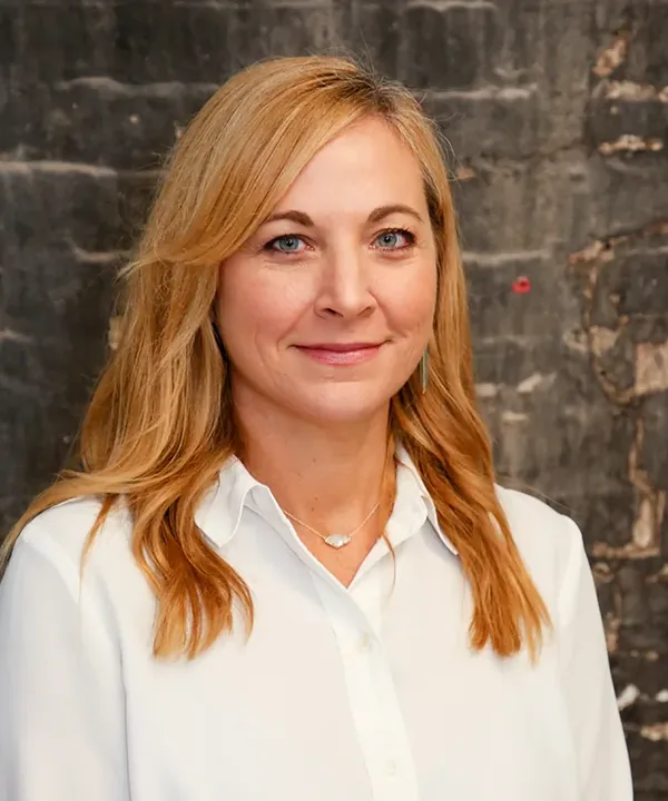 Portrait of Beth Winkler, PT, co-founder and CEO of Magnolia Physical Therapy