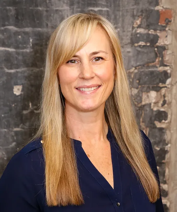 Portrait of Lisa Taglauer, PTA, co-founder and president of Magnolia Physical Therapy