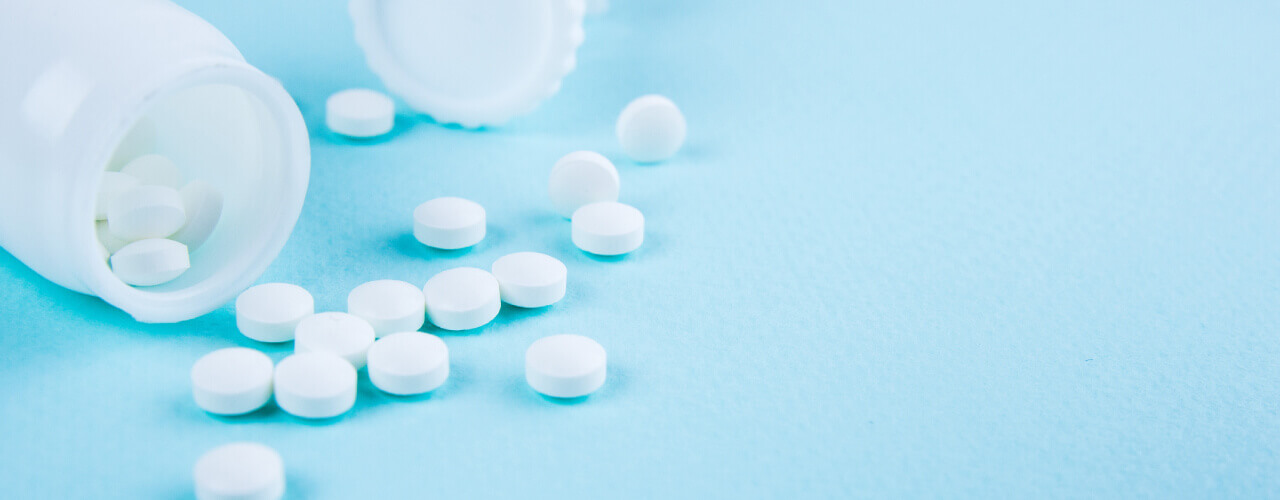opioid pills on a table- avoid dangerous painkillers with physical therapy in new orleans